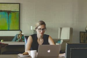 woman using laptop in home office
