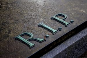 tombstone with "RIP" on it