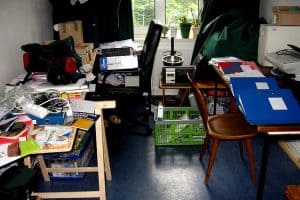 cluttered room and desks