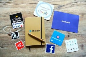 notebook, brochure, stickers with social media logos