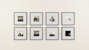 framed photos mounted on a wall